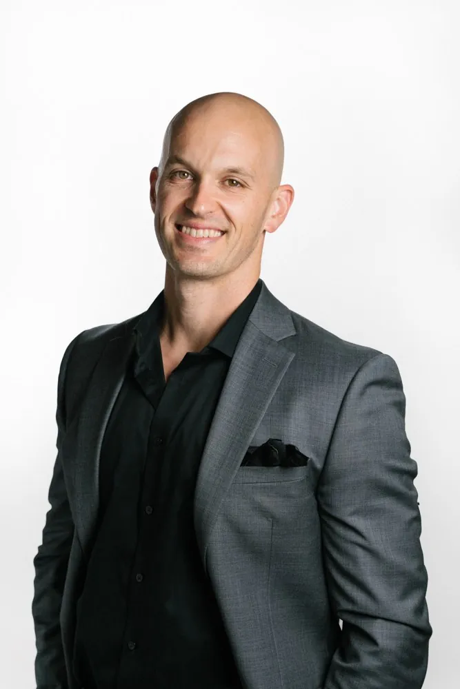 Joe in a suit, his Executive Edge headshot